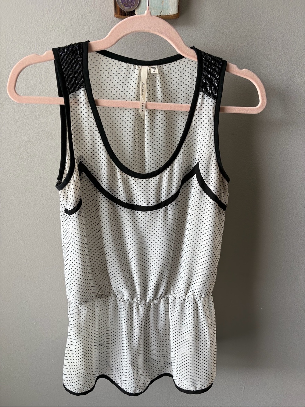 Polka Dot Sleeveless Peplum Top with Beaded Detail